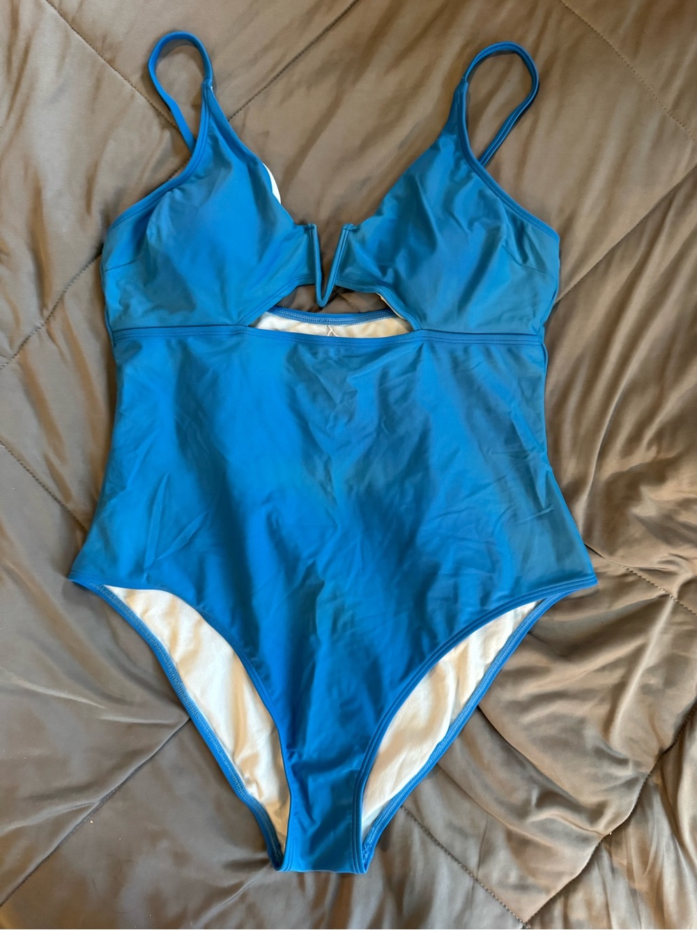 Bright Blue One-Piece Swimsuit with V-Cut Detail